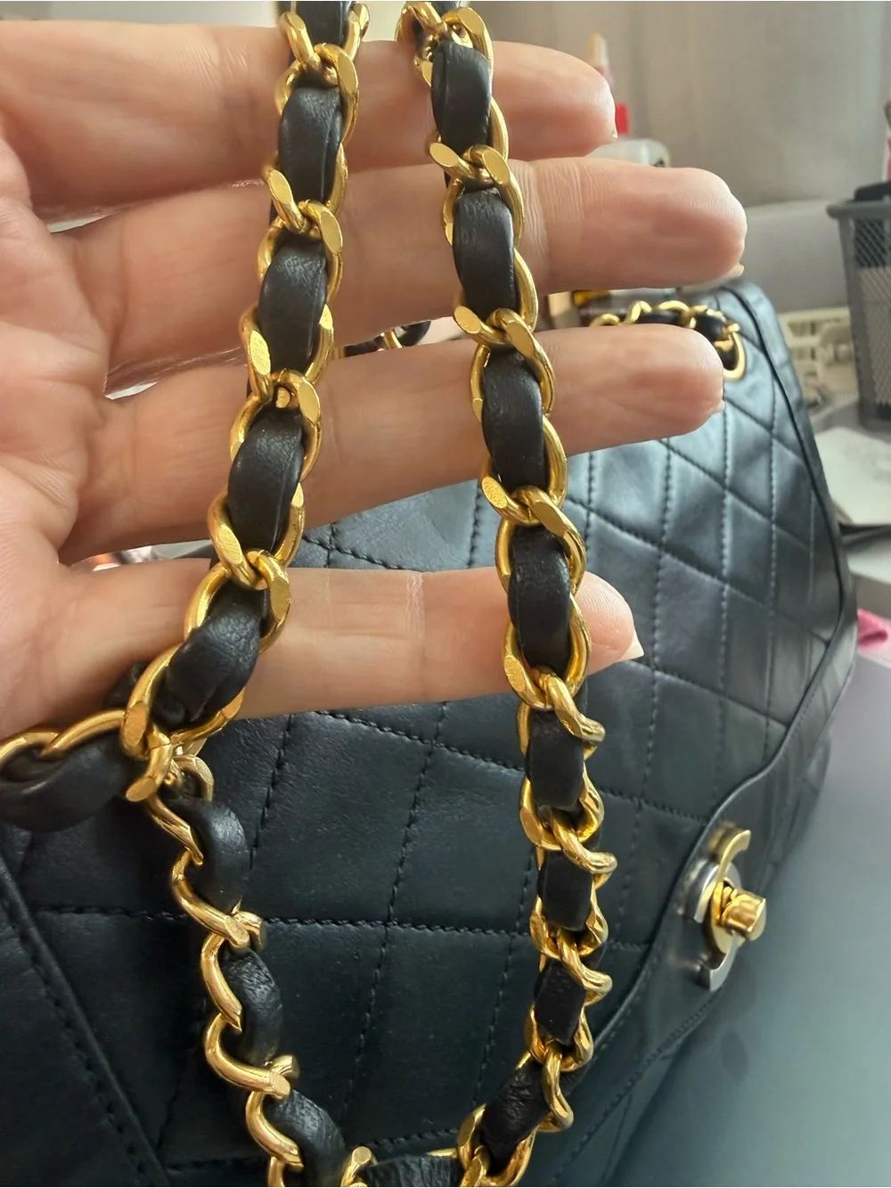 CHANEL Black Quilted Leather Shoulder Bag with Gold Chain Strap